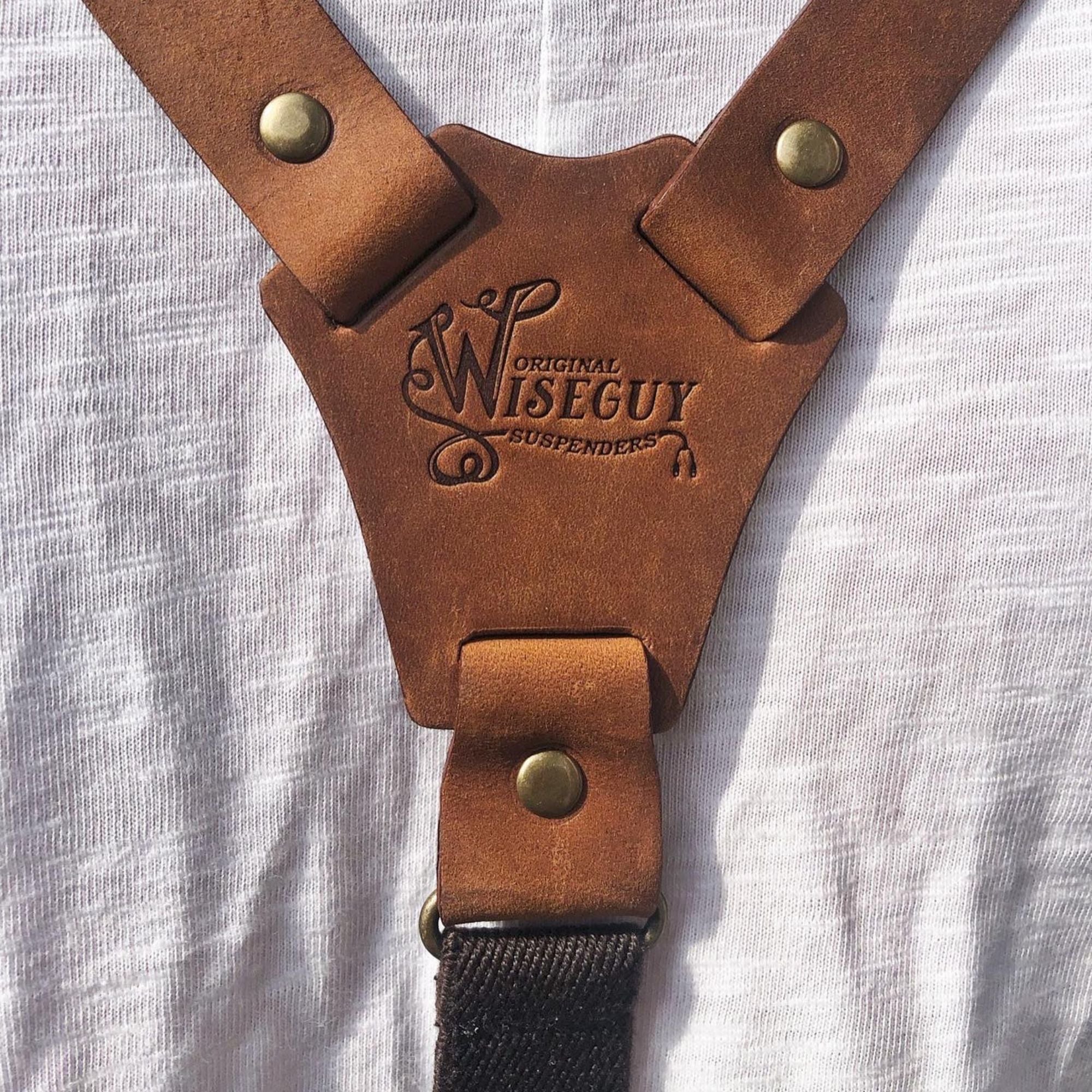 Close-up of leather flex suspenders' back piece.