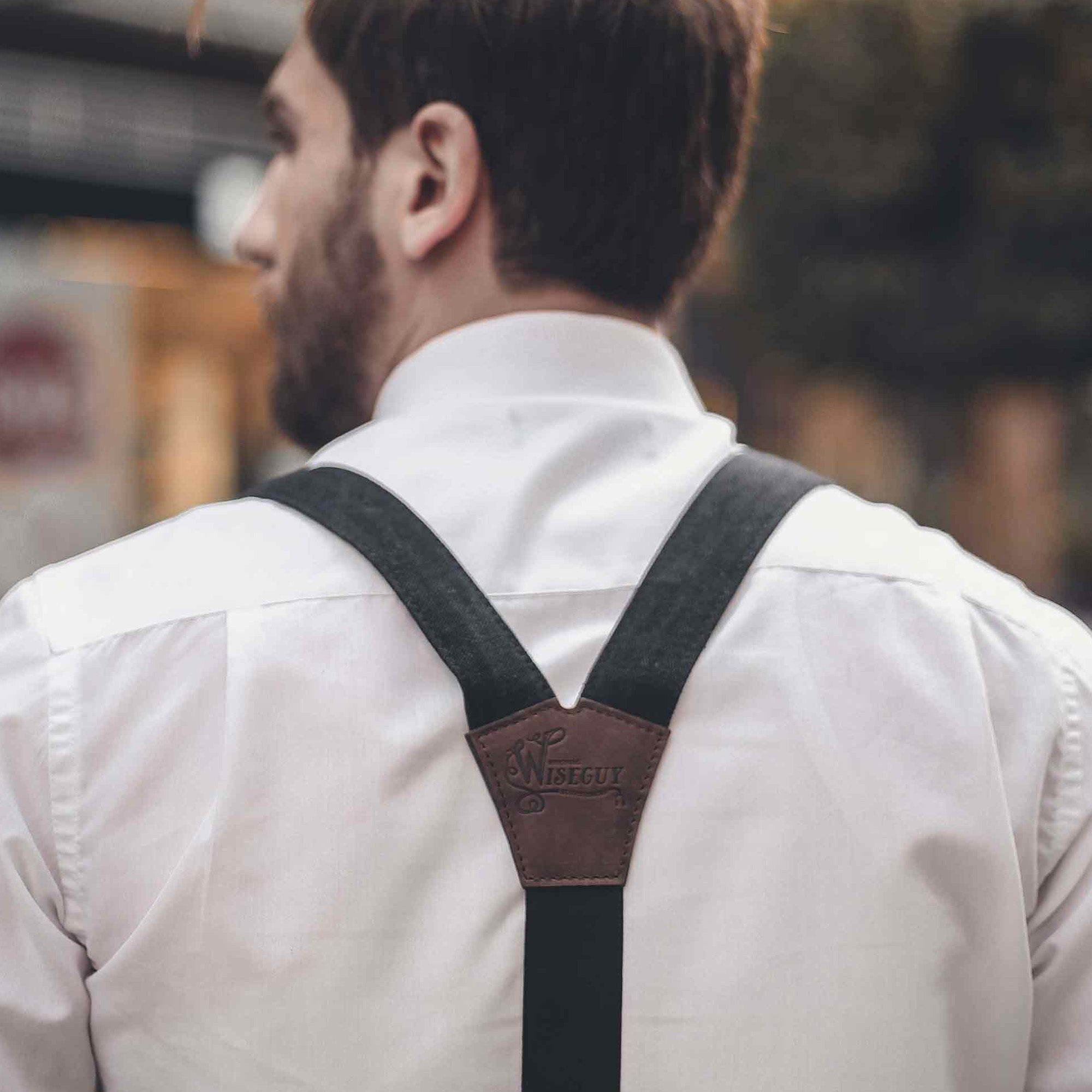 Man wearing Black Wiseguy Duck Suspenders over a white shirt