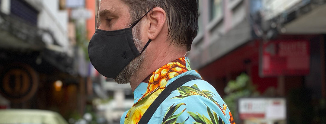 Man wearing Wiseguy Suspender Facewear in the city